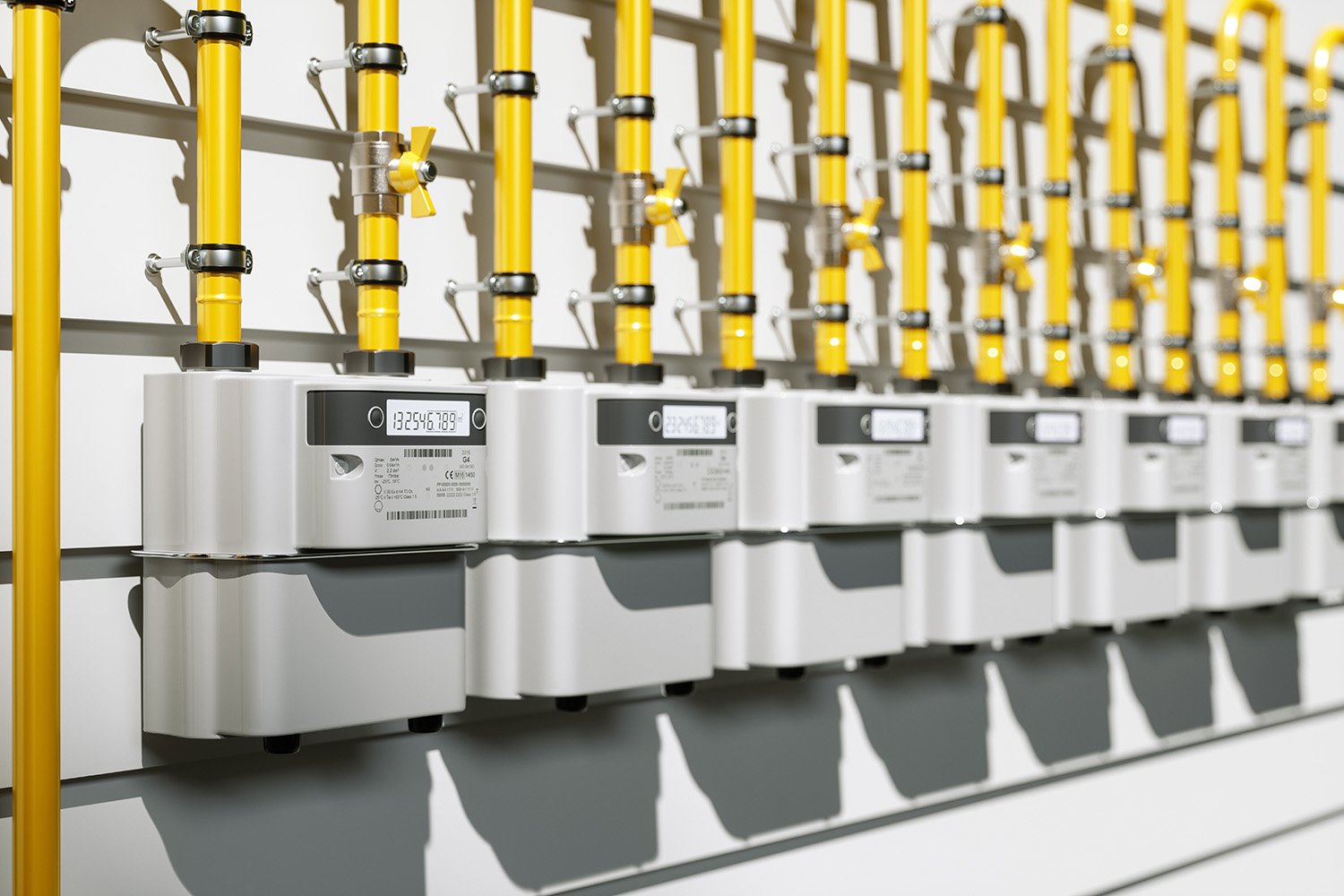 Close-up Of Natural Gas Meters In A Row On Building Wall Close-up Of Natural Gas Meters In A Row On Building Wall